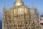 The popular Kyaikhtiyo Pagoda being readied for gold plating. Photo – Mizzima. Known as Lonedawpyih Shwe Thingan, the whole pagoda will be gold plated and the opening ceremony will be held on December 1