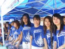 Models selling Yadanabon FC’s souvenirs at a stall in Ba Htoo Stadium on September 5, 2009, during the opening match of the Myanmar National League in Mandalay. Photo – Mizzima. The opening match of the MNL, the first of the Burmese professional league, ended with Yadanabon FC winning 3-1 against Kanbawza FC.