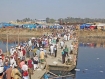 Devotees crossing the bridge for pray, on the bank of River Turag