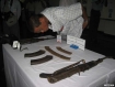 A man zooms for a closer look today (June 4, 2010) at a Rangoon police headquarters display of guns and ammunition used during an armed robbery on the night of May 16 in Dayellu Village in Kunchankone Township.