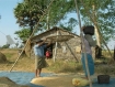 Mudon Township rice farmers winnowing rice grains from their husks in 2009 : IMNA