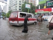 Vehicular and pedestrian traffic slows to a crawl on Mahabandoola Road in central Rangoon on Friday (May 28, 2010) after late-afternoon floods hit the city. Despite Kabaraye weather station rainfall readings of just 0.08 inches (2.02 millimetres) at 3:30 p.m., extensive flooding affected roads in downtown areas. Photo: Mizzima
