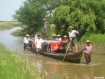 National Democratic Force (NDF) members use a rather different method of transport recently to canvass for votes in Thanlyin Township, Rangoon Division. The junta’s election, which will bring the controversial 2008 constitution into effect, has been called a sham designed as a bid to legitimise the power of Burma’s dictatorial military regime. For that reason, the main opposition party from which the NDF split, the National League for Democracy, has decided to boycott the polls. Photo: Mizzima