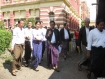 Aung San Suu Kyi (third left) leaves Rangoon Division High Court today, 16th November 2010, after giving testimony in a lawsuit being brought by her party, the National League for Democracy (NLD) against its legal dissolution. The case is expected to continue over coming weeks. The NLD won over 80% of seats in Burma's last general elections held in 1990, the results of which were never honoured by the military regime. The NLD was dissolved by the Burmese military in early 2010 after they decided to boycott the recent 2010 elections. Photo: Mizzima.