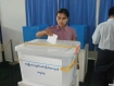 A woman votes in a trial run of booth facilities at a polling station in Latha Township, western Rangoon, on Friday, October 1, 2010. The dry run was part of preparations 37 days ahead of Burma’s first national elections in two decades. Photo: Mizzima