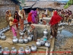 Refugee line up for water at supply station in Lada refugee camp Photo: Kaladan Press 