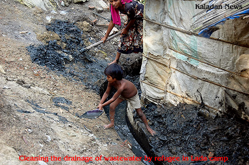 Clearing the drainage of waste water by refugee in Lada camp camp-05