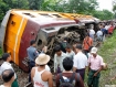  A large crowd gathers around one passenger coach of the Rangoon 'circle' train that derailed on Thursday, September 1, 2011. The last coach of the inbound train slipped off the tracks at 1:55 p.m local time and derailed, seriously injuring four passengers. Photo: Mizzima