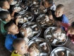 Monastery orphanage needs donors and teachers :: Orphans in Aung Zeya Min Monastery School in Hlaingtharyar Township in Rangoon gather at a communal table on Saturday, April 30, 2011. More than 350 orphans including about 200 Nargis victims live in the monastery operated by Abbot Bhaddanta Zeya Nanda with the help of private donors. About three baskets (3.34 bushels) of rice are consumed each day. Photo:Mizzima