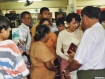 Kyi mingles with the crowd at NLD headquarters following a ceremony to give money to help support the families of political prisoners in Burma on Tuesday, May 10. Photo: Mizzima