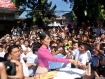 NLD leader Aung San Suu Kyi among her supporters and reporters outside the NLD headquarters in Rangoon after the NLD voted to re-register and to re-emerge as a legal political force in Burma. Photo: Mizzima