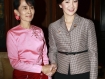 Thai prime minister Yingluck Shinawatra, right, meets Aung San Suu Kyi in Yangon, Burma (AP)