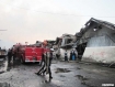 Deadly warehouse explosion, fire devastates large area Firemen work to extinguish secondary fires after a massive explosion among warehouses in an industrial area of Rangoon on Thursday, December 29, 2011. Photo: Mizzima 