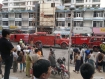 A fire in a high-rise building that houses shops and apartments at Shwe Phyu Plaze broke out in Mandalay on Wednesday, May 18, but was quickly extinguished. The plaza is opposite Yadanarpon Diamond Plaza, where a large fire caused significant damage in 2008. Photo: Mizzima
