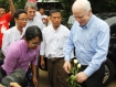 Children at the NLD HIV center presented US Sen. John McCain with flowers. Photo: Mizzima