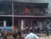 Aung Tin Win's storefront home in Three Pagodas Pass after it was hit by RPG fire. Photo: IMNA