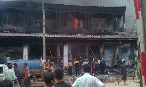 Aung Tin Win's storefront home in Three Pagodas Pass after it was hit by RPG fire ttp_fighting_bur