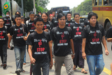 Journalists walk in a free spech and free press rally in Rangoon on Saturday,  August 4, 2012.  Photo: Hein Htet / Mizzima