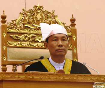 Speaker Shwe Mann in traditional Burmese dress in Parliament. Photo: Mizzima Speaker Shwe Mann in traditional Burmese dress in Parliament. Photo: Mizzima