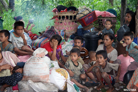Karen refugees who fled the fighting between government forces and the Karen Independence Army huddle together for safety in the jungle, in this file photo. Photo: Mizzima Karen refugees who fled the fighting between government forces and the Karen Independence Army huddle together for safety in the jungle, in this file photo. Photo: Mizzima