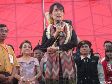 Opposition leader Aung San Suu Kyi speaks at a music festival in Rangoon in this file photo. Photo: Mizzima In an audio broadcast played to delegates in the main hall, she said: “We yearn to be a part of the global community: not only to be economically and socially connected, but also to achieve the domestic political stability and national reconciliation that would enable us to fully address the needs of our people.” Suu Kyi, who will run for a seat in the Burmese Parliament in April, told the delegates that “despite my isolation from much of the world” she had followed the world’s response to the world’s economic downturn by “listening assiduously to radio broadcasts.” She also addressed the forum last year. Here is the full text of her remarks: Distinguished guests – heads of state, government Opposition leader Aung San Suu Kyi speaks at a music festival in Rangoon in this file photo. Photo: Mizzima In an audio broadcast played to delegates in the main hall, she said: “We yearn to be a part of the global community: not only to be economically and socially connected, but also to achieve the domestic political stability and national reconciliation that would enable us to fully address the needs of our people.” Suu Kyi, who will run for a seat in the Burmese Parliament in April, told the delegates that “despite my isolation from much of the world” she had followed the world’s response to the world’s economic downturn by “listening assiduously to radio broadcasts.” She also addressed the forum last year. Here is the full text of her remarks: Distinguished guests – heads of state, government