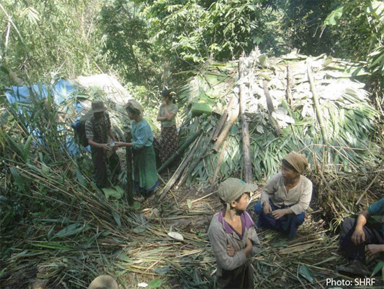 This file photo shows Shan war refugees living in the jungle in grass shelters in Shan State. Photo: SHRF