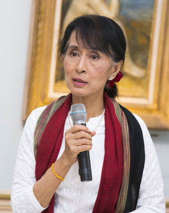 Aung San Suu Kyi, the chairperson of the Burmese National League for Democracy and a member of Parliament, speaks at a Women's Forum dinner in France on Friday, June 29, 2012. Photo: Women's Forum for the Economy and Society