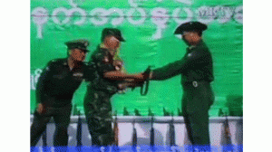 Nai Shaung hands over weapons to SEC at Moulmein