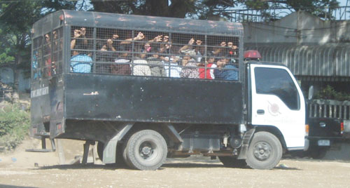 Illegal Burmese migrants are shown being deported to Myawaddy, Burma, by Thai police. IMG_007_edited