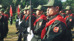Mon National Libration Armies Stand Attention at the Mon National Day Ceremony in Banan Bon Village on February 19th