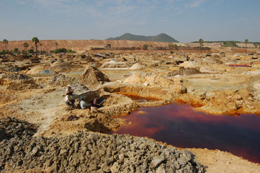 Villagers sifting through toxic mining waste leftover from the operations of Monywa's Myanmar Ivanhoe Copper Company Ltd. (MICCL). Ivanhoe_Copper_Company
