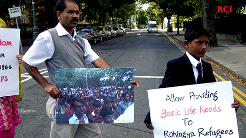 Demonstrators carrying postcard along the road to Embassy R-Ireland-04