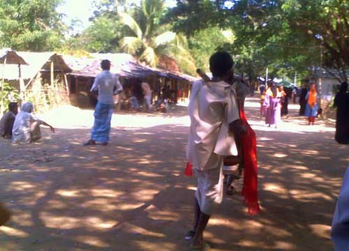 pic_3_A_patient_carried_to_Nayapara_clinic_by_his_family_members