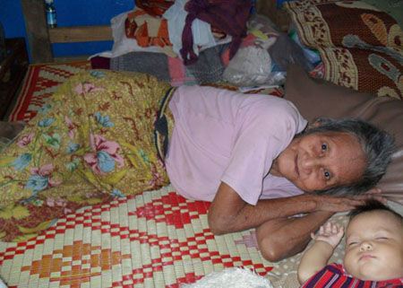 an elder grandmother and a baby in Sayarma Naw Paw Lu Lu's Safe House lulu_P3