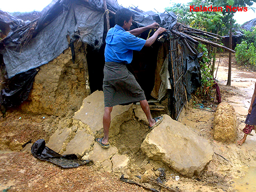 The heavy rain destroyed the mud wall of shack where the refugee try to protect the rain not to enter raindestory-02