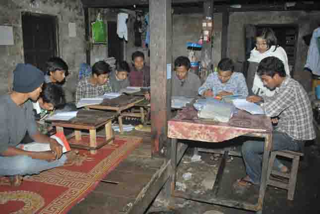 Ma Htet Htet San is shown teaching her students at her private school. pp3