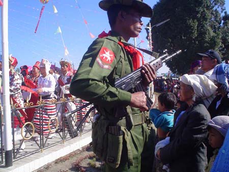 A Burmese soldier takes position in the Kachin Manau cultural festival in Myitkyina dsc00823