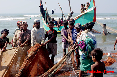 Rohingya fishermen tend to their nets Rohingya fishermen tend to their nets