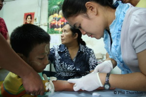 Dr-Cynthia-and-medic-taking-blood