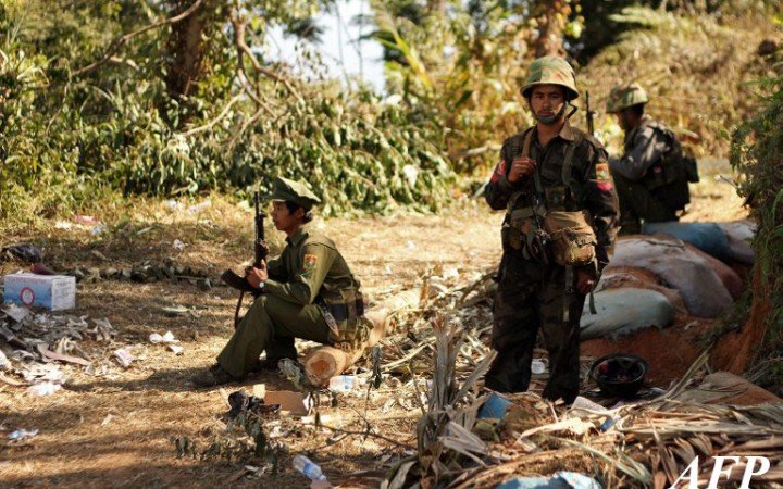 Kachin Independence Army (KIA) 3rd Brigade soldiers stand guard at Hka Ya mountain in Kachin province on January 20, 2013. AFP PHOTO Kachin Independence Army (KIA) 3rd Brigade soldiers stand guard at Hka Ya mountain in Kachin province on January 20, 2013. AFP PHOTO