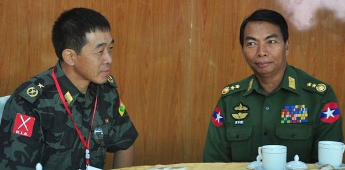 Maj. Gen. Gun Maw (left), KIA chief of staff, and Lt. Gen. Myint Soe (right), Burma Defense Ministry, in Myintkyina.
