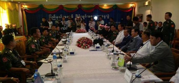 The PSLF and government peace team meet in July in the northern Shan state town of Musal. 