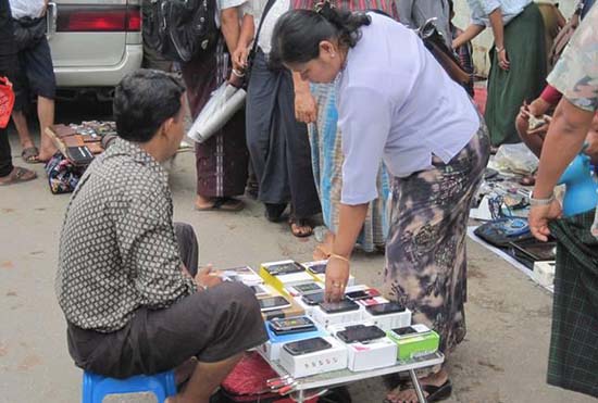 Bogyoke Aung San Road – where many peddle smartphones and smartphone-related accessories. Bogyoke Aung San Road – where many peddle smartphones and smartphone-related accessories.