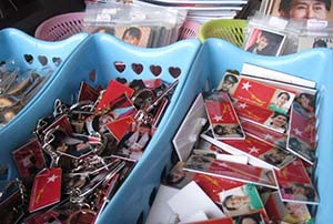 IMG 6704 Aung San Suu Kyi photos were reproduced as sticker posters key chain and sale at the NLD office