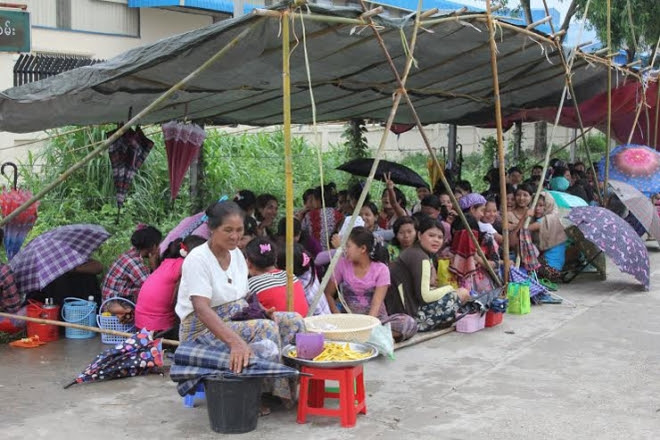 Striking workers outside the Li Kyant Footwear Factory in Yangon's outer western Hlaing Tharyar Township on June 11. Photo: Nyein Thit Nyi Striking workers outside the Li Kyant Footwear Factory in Yangon's outer western Hlaing Tharyar Township on June 11. Photo: Nyein Thit Nyi Striking workers outside the Li Kyant Footwear Factory in Yangon's outer western Hlaing Tharyar Township on June 11. Photo: Nyein Thit Nyi Striking workers outside the Li Kyant Footwear Factory in Yangon's outer western Hlaing Tharyar Township on June 11. Photo: Nyein Thit Nyi