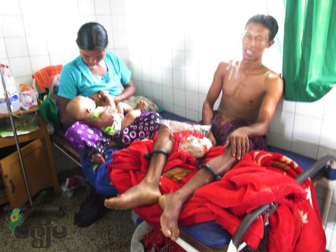 သေနတ်ကျဉ်မှန်၍ ဆေးကုသနေသည့် စွပ်စွဲခံရသူကို တွေ့ရစဉ်။ သေနတ်ကျဉ်မှန်၍ ဆေးကုသနေသည့် စွပ်စွဲခံရသူကို တွေ့ရစဉ်။