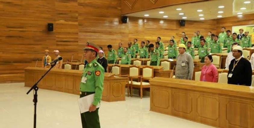 Gen. Hla Oo from the 66th Light Infantry Division (LID-66) takes an oath as the new Shan State Minister for Security and Border Affairs during an emergency session of the Shan State Hluttaw