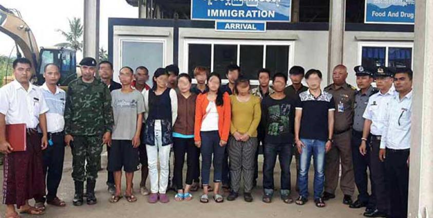 The Thai police hand over 14 migrant workers to Myanmar authorities in Tachileik-Mae Sai border area on July 17 after they were arrested.