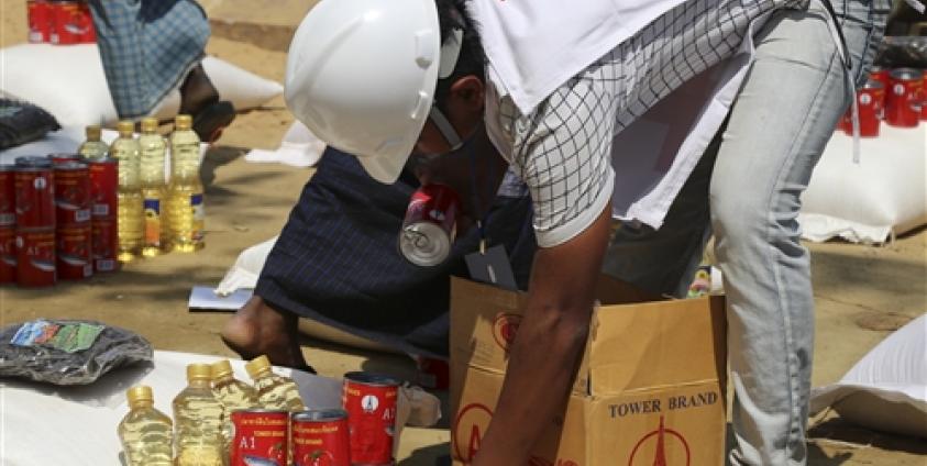 ICRC မှ ရခိုင်တွင် ကူညီထောက်ပံ့ပေးနေသည့်ပုံတစ်ပုံ (ဓာတ်ပုံ- ICRC)