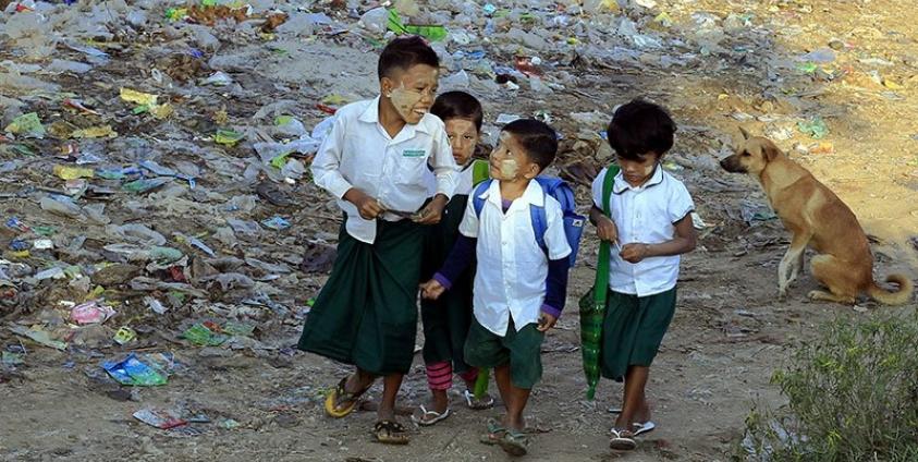 Myanmar children go to school near the bank of the Irrawaddy River in Mandalay, Myanmar. Photo: Hein Htet/EPA